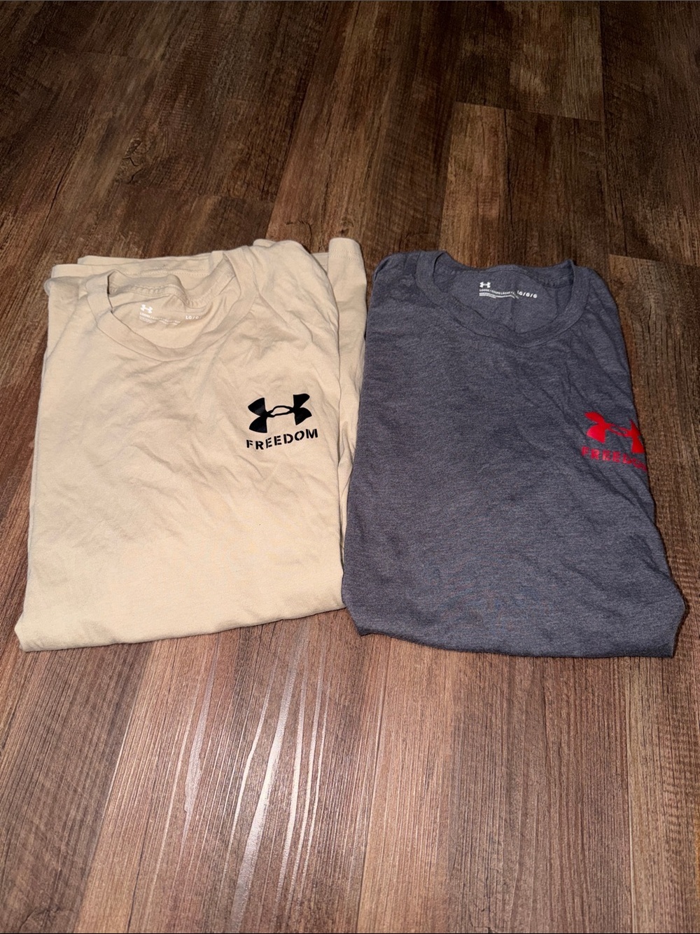 Lot of 2 Mens Under Armour Freedom SS t-shirts size L EEUC Flag Patriotic
